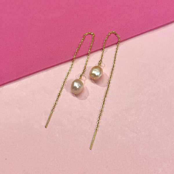 Pearls on a string - peachy